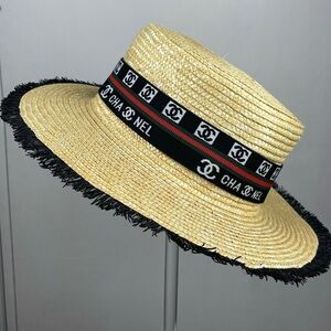 CHANEL Woven Hat with Black and Red Trim